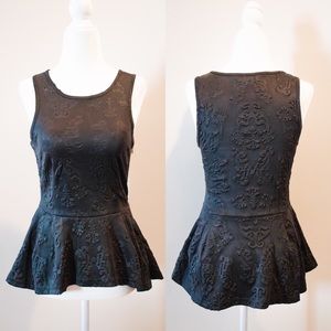 Black peplum tank worn once